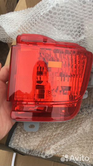 Фонарь бампера Тойота 200 рестайлинг