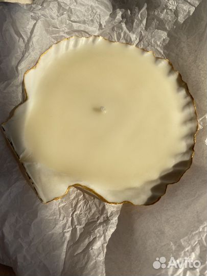 Свеча в раковине морского гребешка