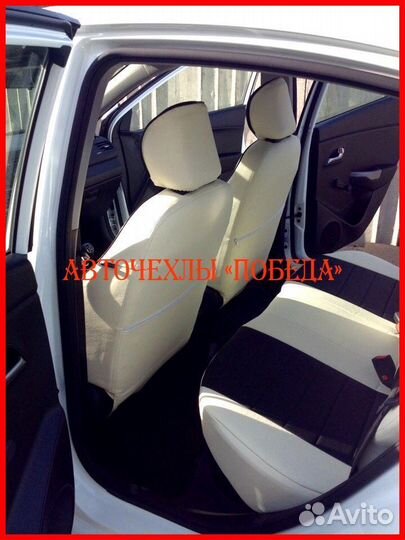 Чехлы Kia Rio 3 седан из экокожи бело-чёрные Класс