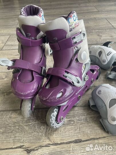 Роликовые коньки