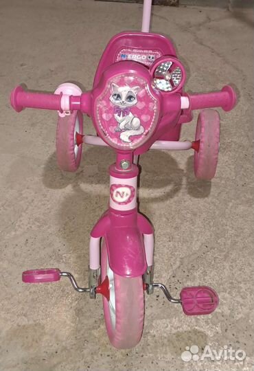 Трехколесный велосипед с ручкой