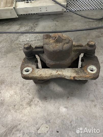 Суппорт передний левый kia spectra