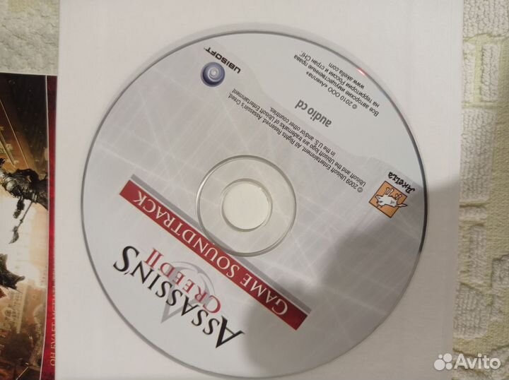 Assassins creed II + диск Soundtrack+книга