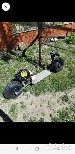 Бензиновый самокат