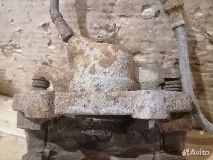 Суппорт тормозной передний левый Chery Fora (A21)