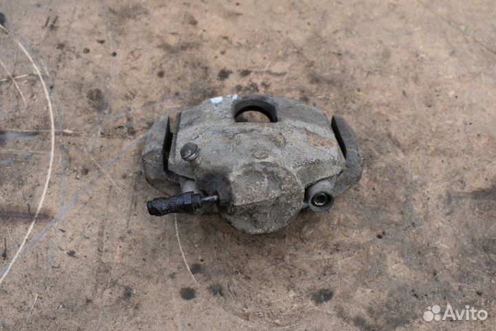 Суппорт тормозной передний левый Ford Fiesta MK5