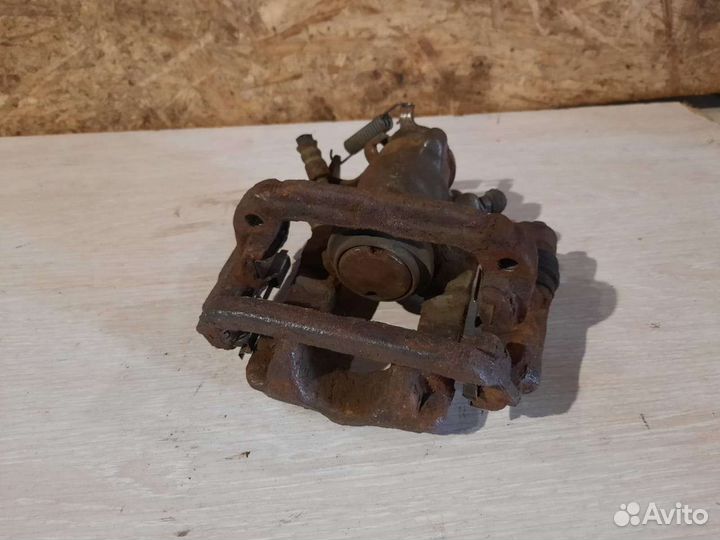 Суппорт задний левый Opel Mokka 4WD