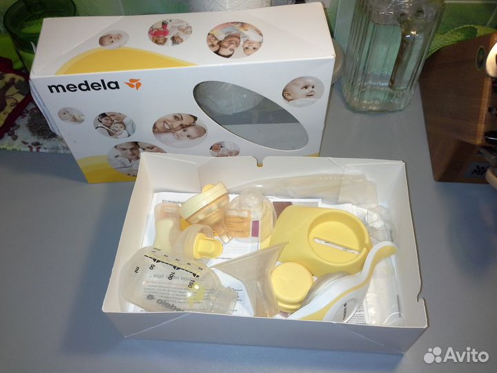 Ручной двухфазный молокоотсос medela и смартсоска