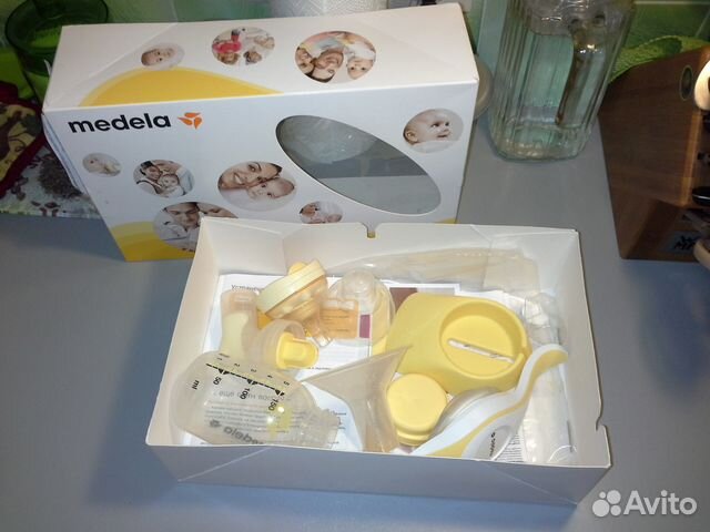 Ручной двухфазный молокоотсос medela и смартсоска