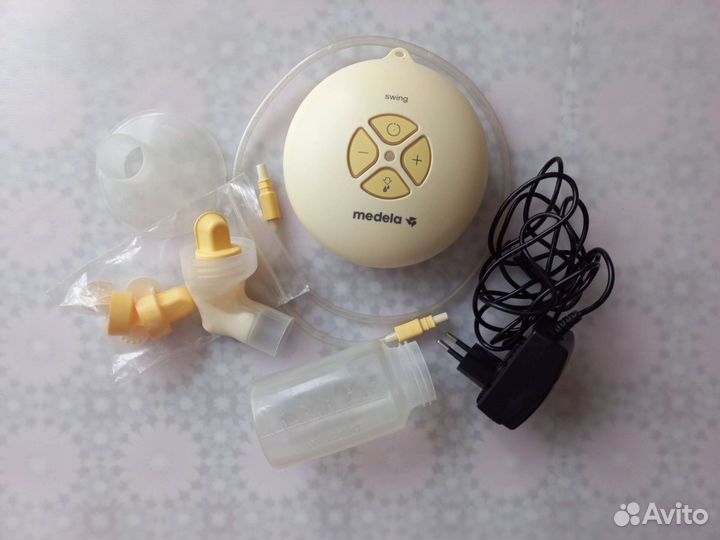 Молокоотсос Medela Swing+ручной Kari+бутылочки