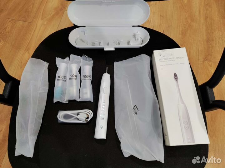 Электронная зубная щетка