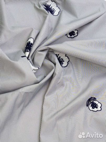 Отрез ткани с вышивкой