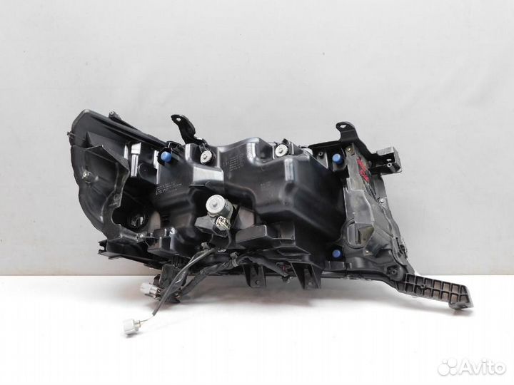 Фара левая Toyota Land Cruiser