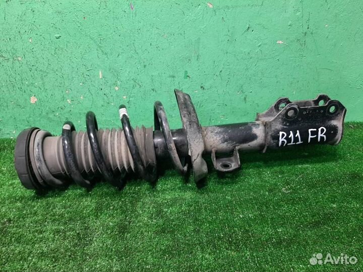 Стойка амортизатора передняя правая Opel Zafira C