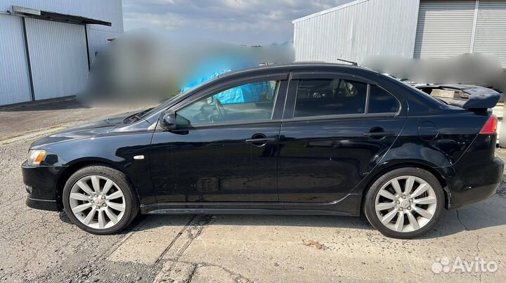 Стойка подвески задняя правая Mitsubishi Lancer 10