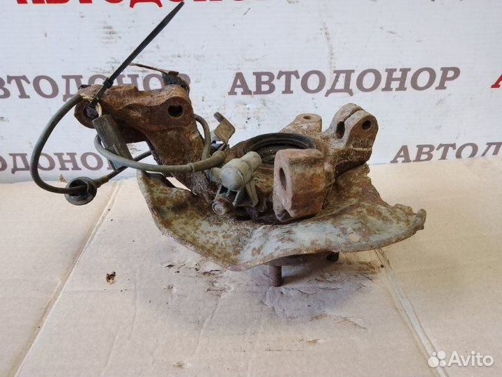 Поворотный кулак передний левый Mazda 626 GE