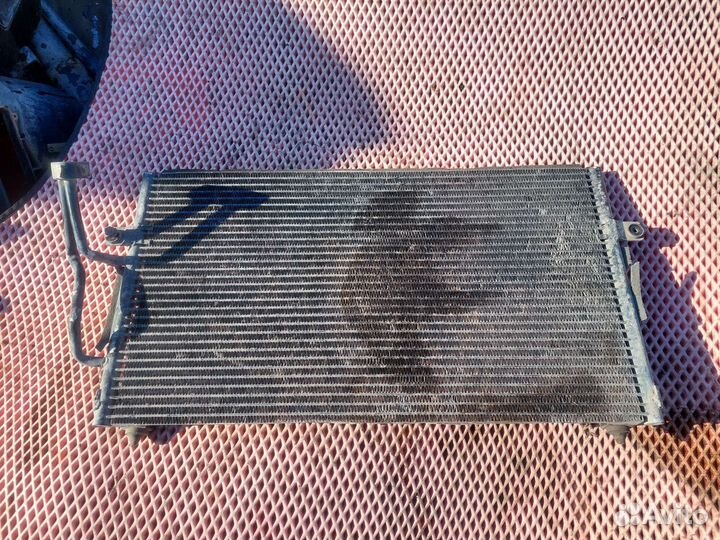 Радиатор кондиционера Mitsubishi Carisma