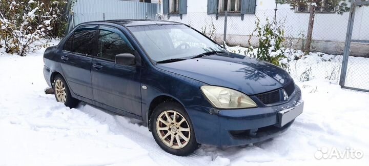 Mitsubishi Lancer 1.3 МТ, 2004, 117 000 км
