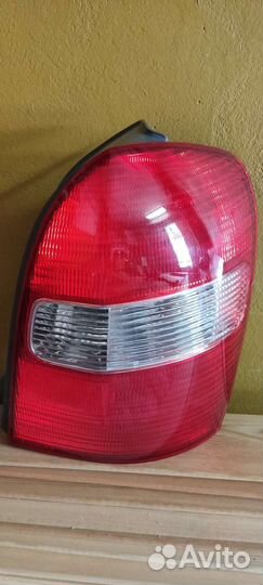 Фонарь задний Mazda familia s-wagon