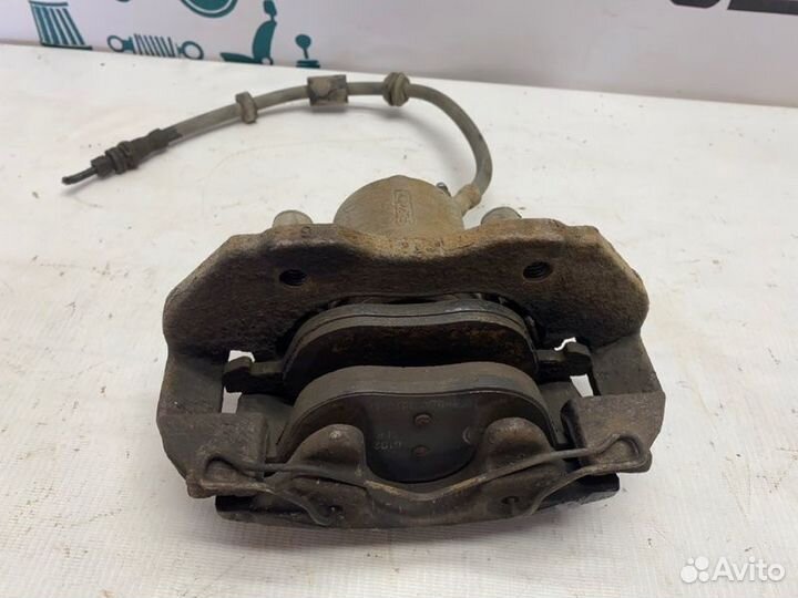 Суппорт тормозной передний правый Ford Focus седан