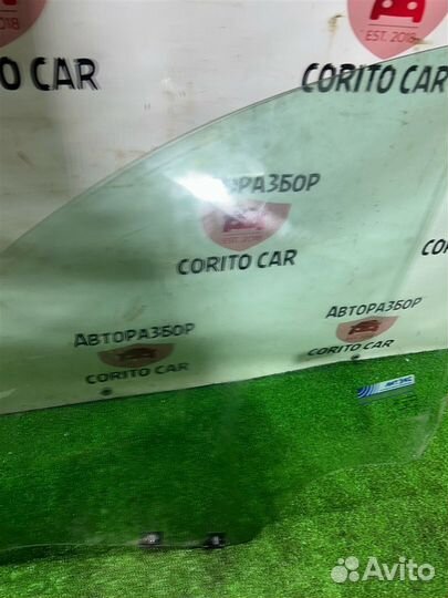 Стекло двери переднее левое Nissan Terrano D10