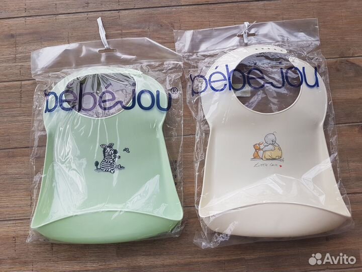 Нагрудник пеликан из пластика с карманом 1 шт