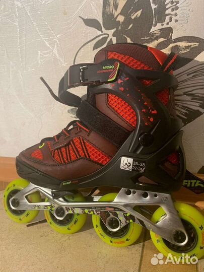 Роликовые коньки