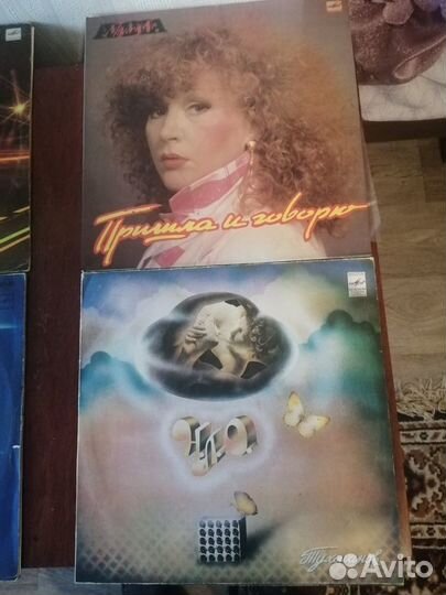 Виниловые пластинки и проигрыватель