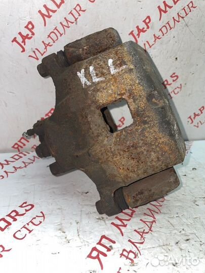 Суппорт тормозной передний левый Mitsubishi