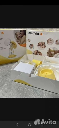 Молокоотсос medela электрический