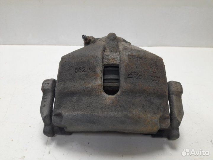 Суппорт передний левый Volkswagen Passat B7