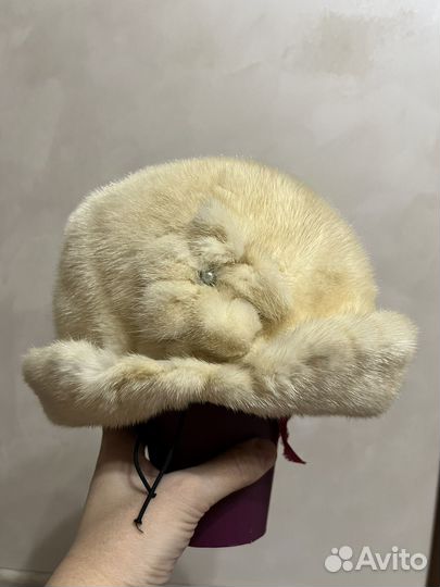 Женские зимние меховые шапки