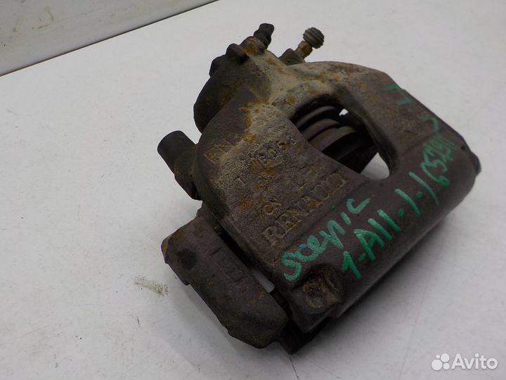 Суппорт тормозной передний левый Renault Scenic 20