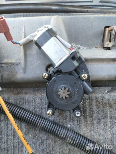 Моторчик лев-го стеклопод-ка на додж караван 4
