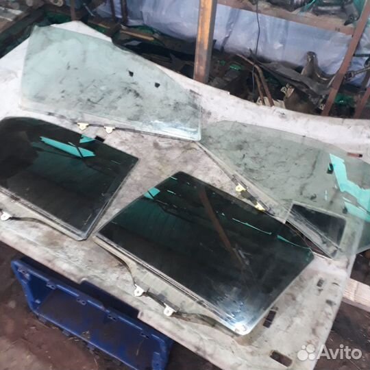 Стекло боковой двери Мицубиси Лансер 9