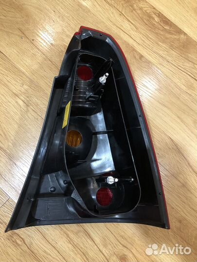 Фонарь задний левый Renault Logan 1 оригинал