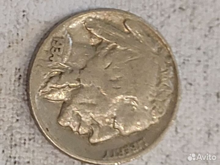 Монета номиналом 5 центов с изображением буйвола