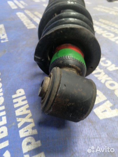 Задняя стойка амортизатора Toyota Progres седан