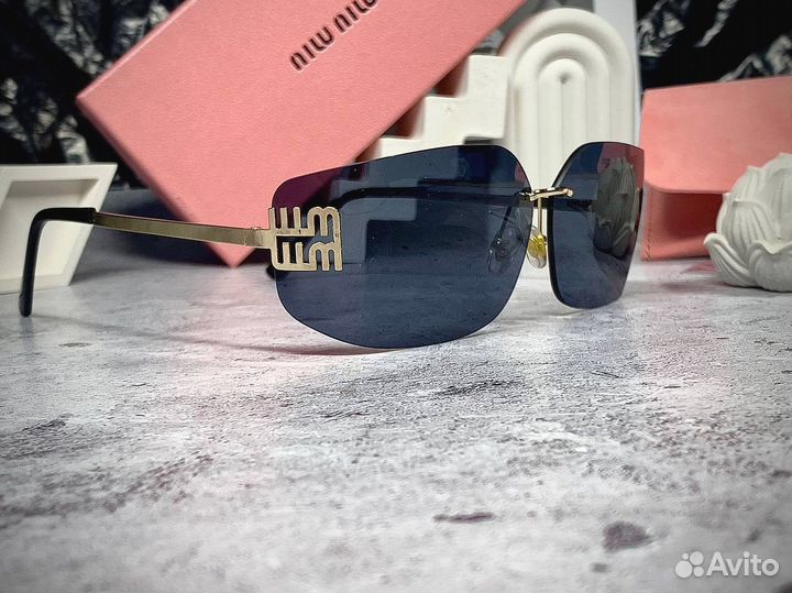 Очки Miu Miu женские