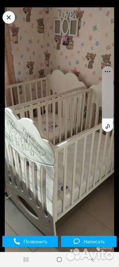 Детская кроватка с маятником