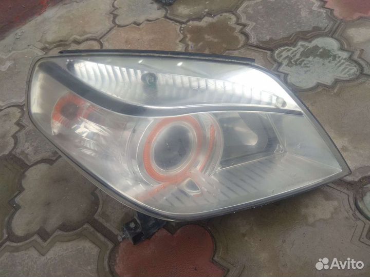 Фара Geely MK Cross