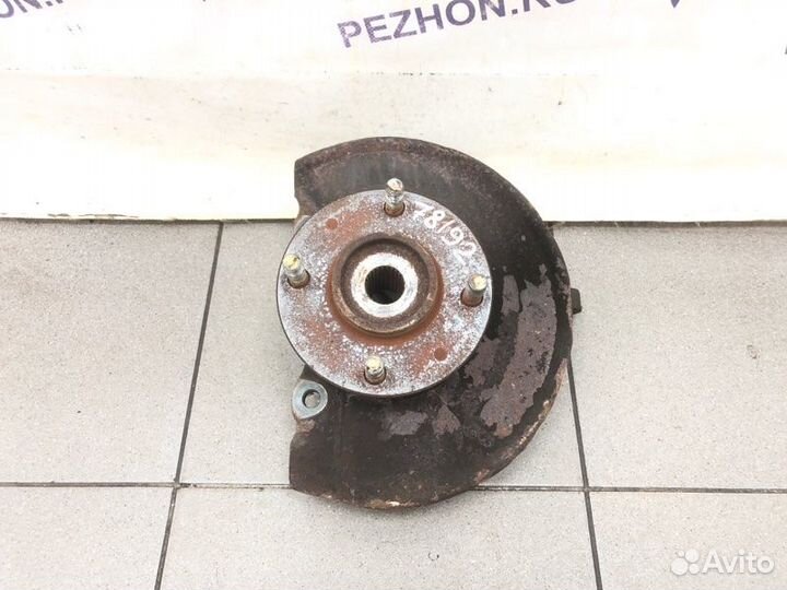 Кулак поворотный передний левый Mitsubishi Lancer