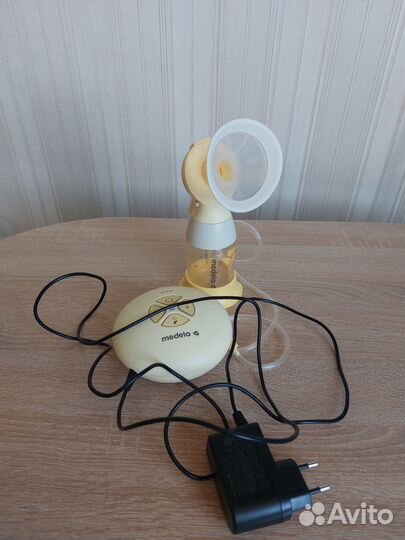 Молокоотсос Medela Swing flex электрический