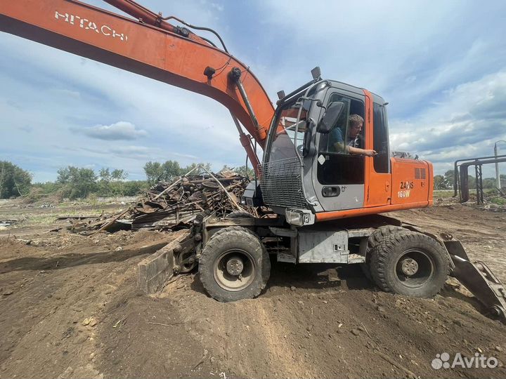 Колёсный экскаватор Hitachi EX160W, 2003