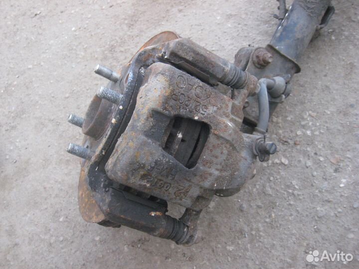 Суппорт тормозной передний Шевроле Авео Т250