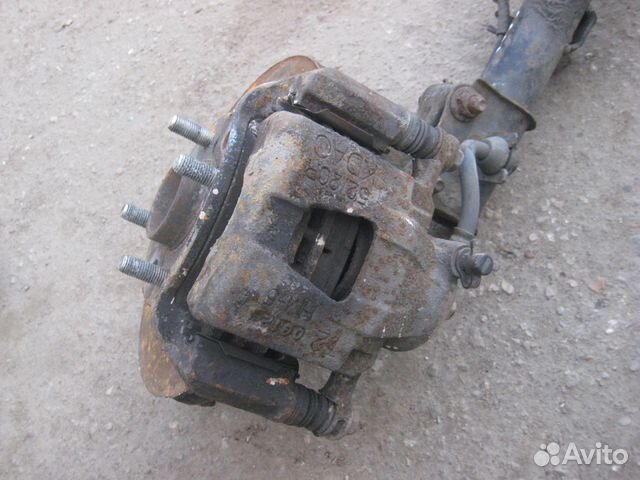 Суппорт тормозной передний Шевроле Авео Т250