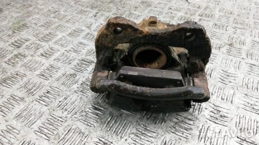 Суппорт тормозной передний правый nissan primera P