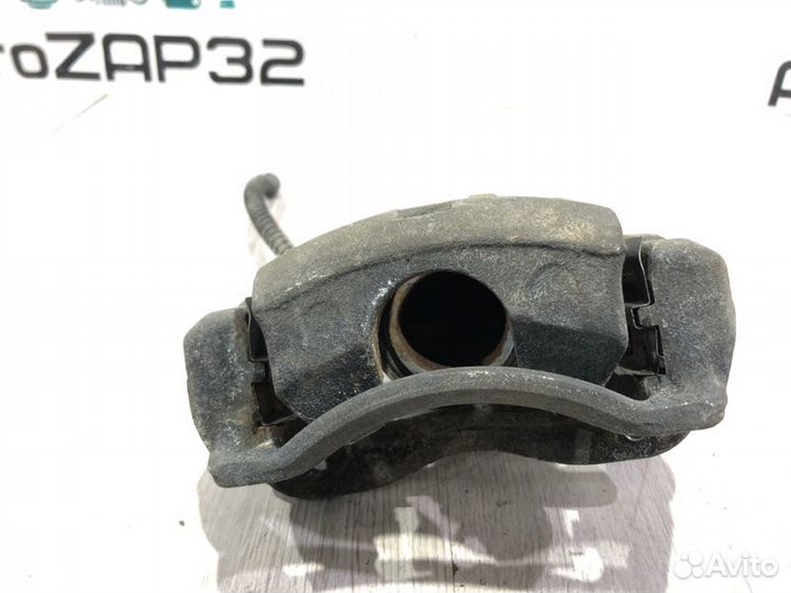 Суппорт тормозной передний левый Kia Rio 3 G4FA