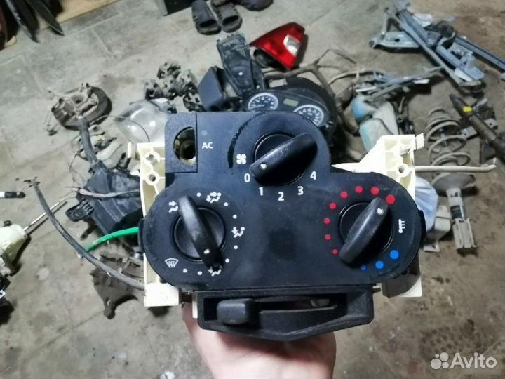 Блок управления отопителем Renault Logan