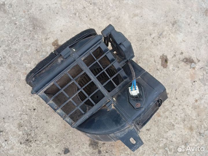 Моторчик печки в корпусе lifan smily